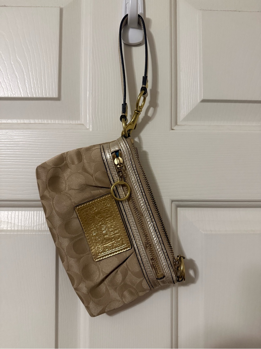 Coach Gold-Tone Signature Wristlet in Shimmering Beige